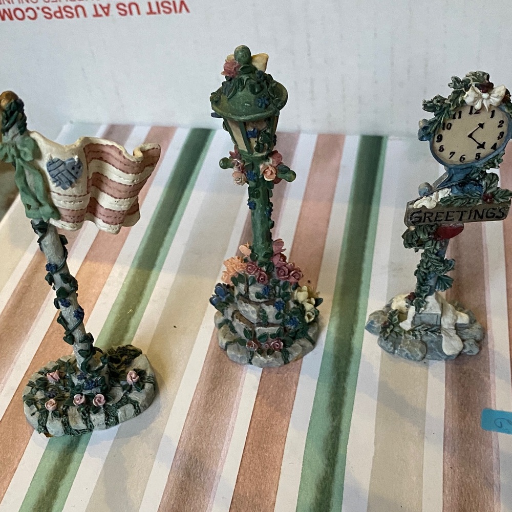 Charming Ceramic Figurine Set with Flag, Lamp, and Clock 3
